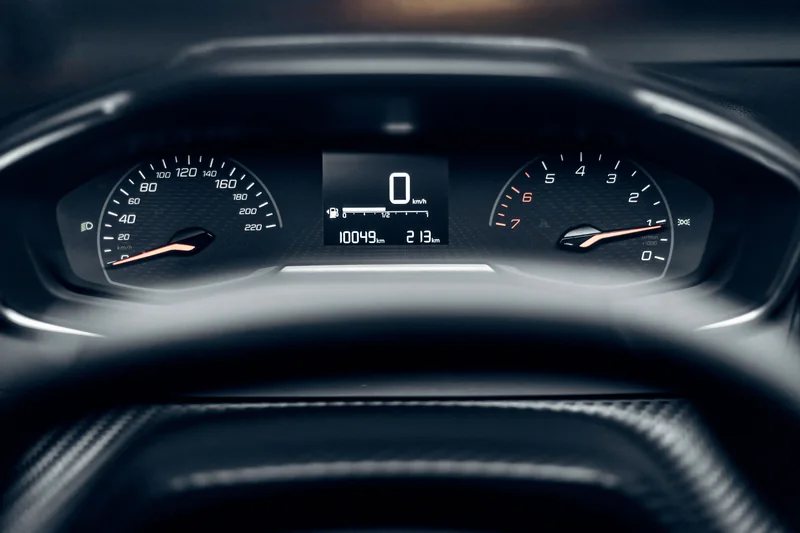 A vehicle instrument cluster showing its odometer