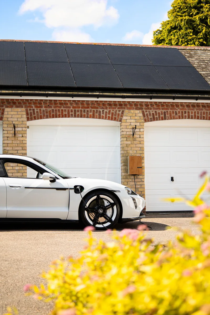 Electric car charging on residential driveway