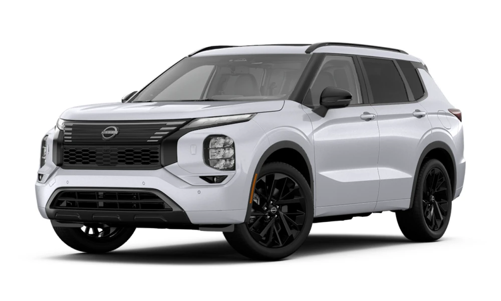 2026 Nissan Rogue Plug-in Hybrid in white, full vehicle front three-quarter view facing left