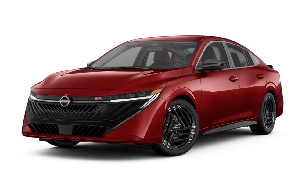 2026 Nissan Sentra in Scarlet Ember Tintcoat, full vehicle front three-quarter view facing left