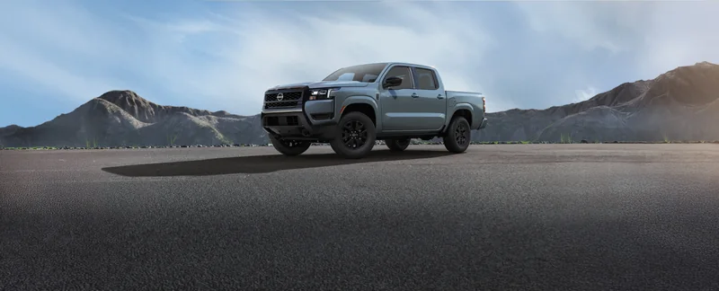 Gray Frontier on a mountain dirt track, shown in a front three-quarter view
