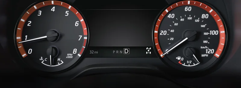 Nissan analog instrument cluster close-up