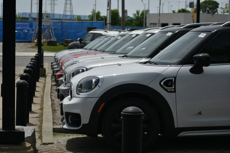 A row of MINI vehicles at a dealership
